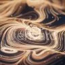 Wave particles lines with swirling pattern